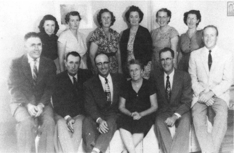 Photo of
                Nancy with her 11 grown children.